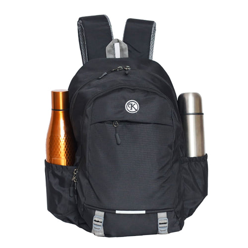 KrishBags Compact Backpack, a slim daypack with a padded laptop compartment and bottle pockets on both sides